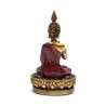Buda tranquilizador con trono